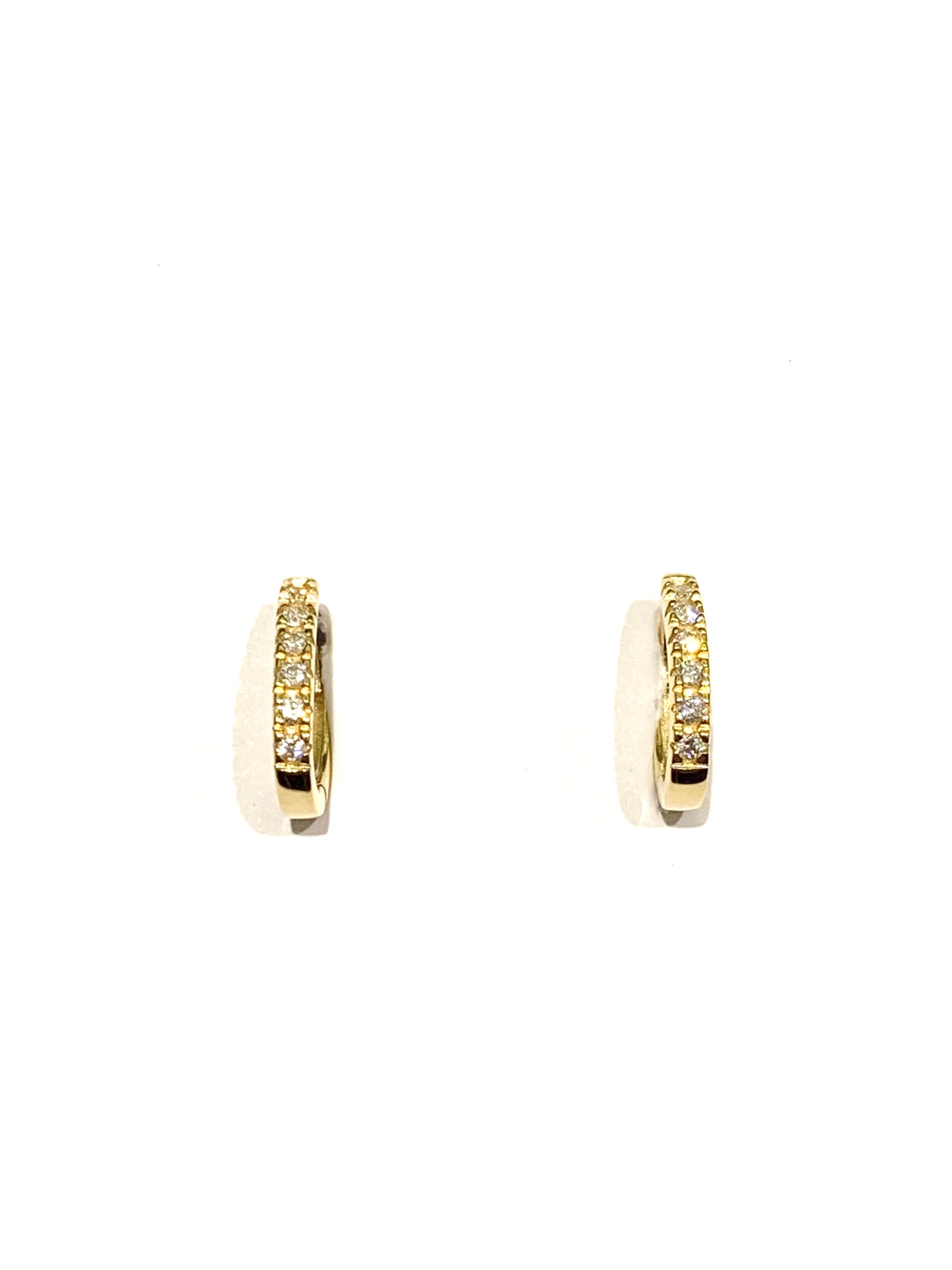 Orecchini oro giallo 18kt a cerchio ovale e zirconi