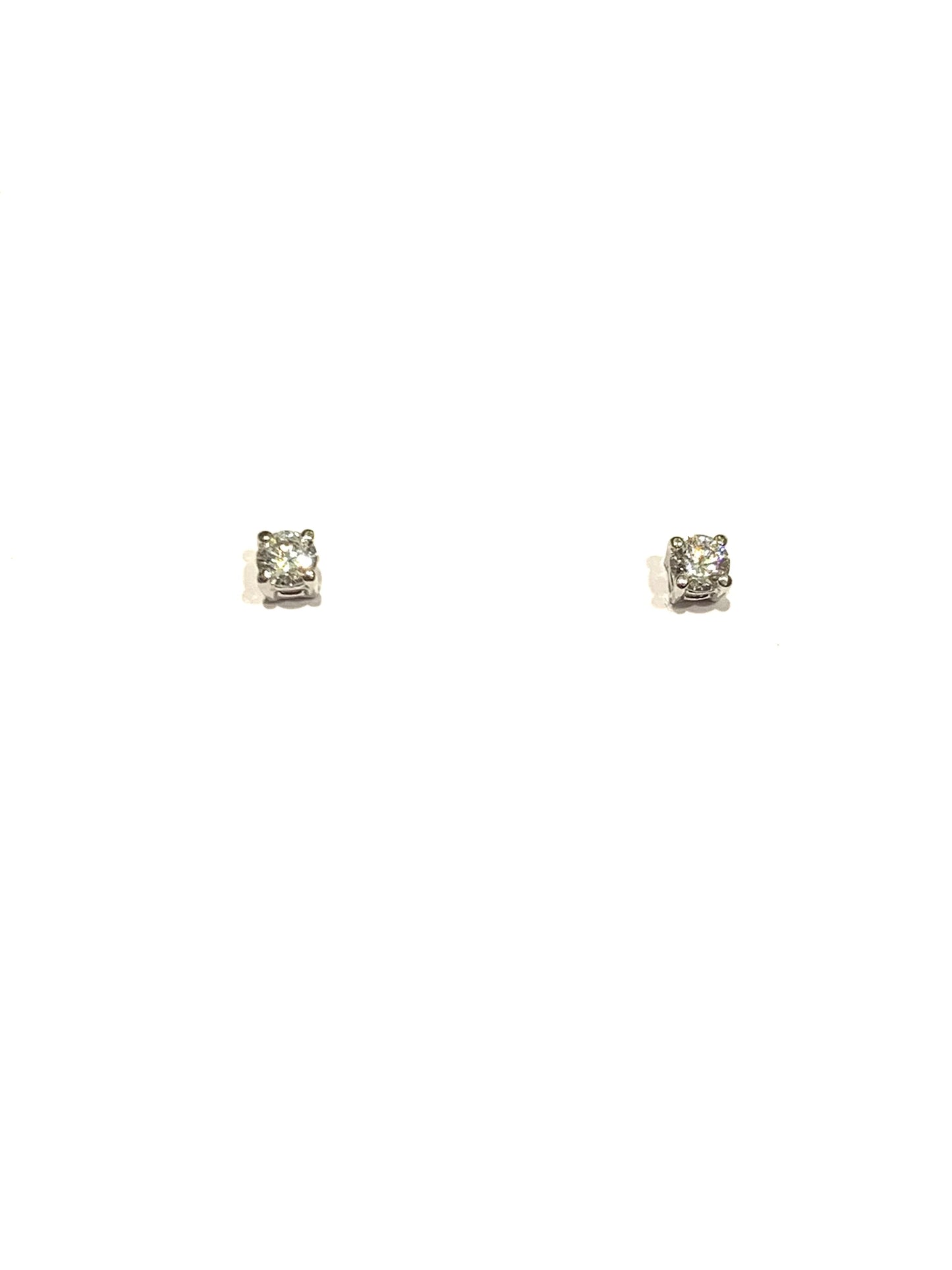 Orecchini oro bianco 18kt con punti luce