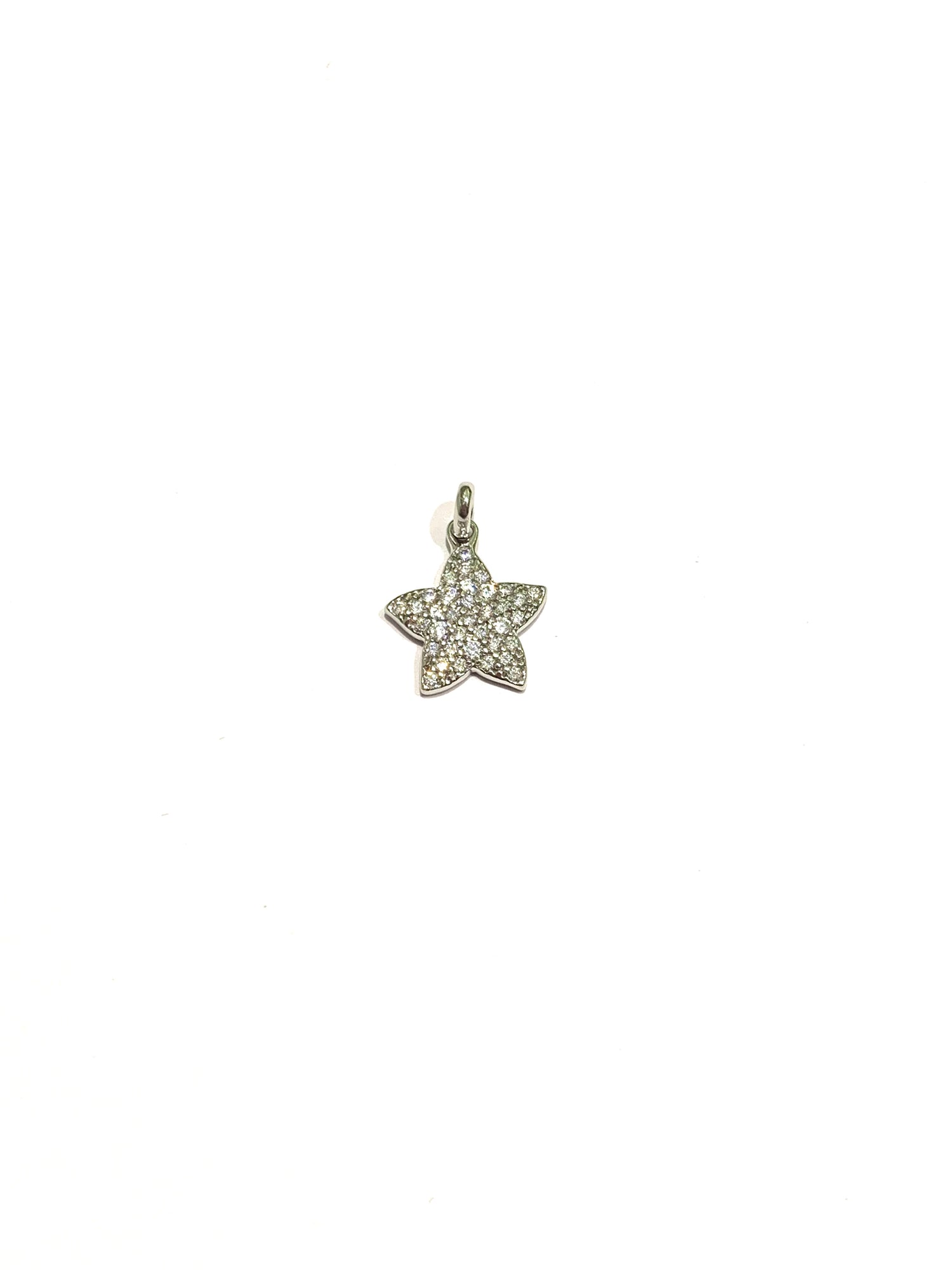 Ciondolo per collana in oro bianco 18kt con stella ricoperta interamente da zirconi.  Dimensione 1,4 cm.