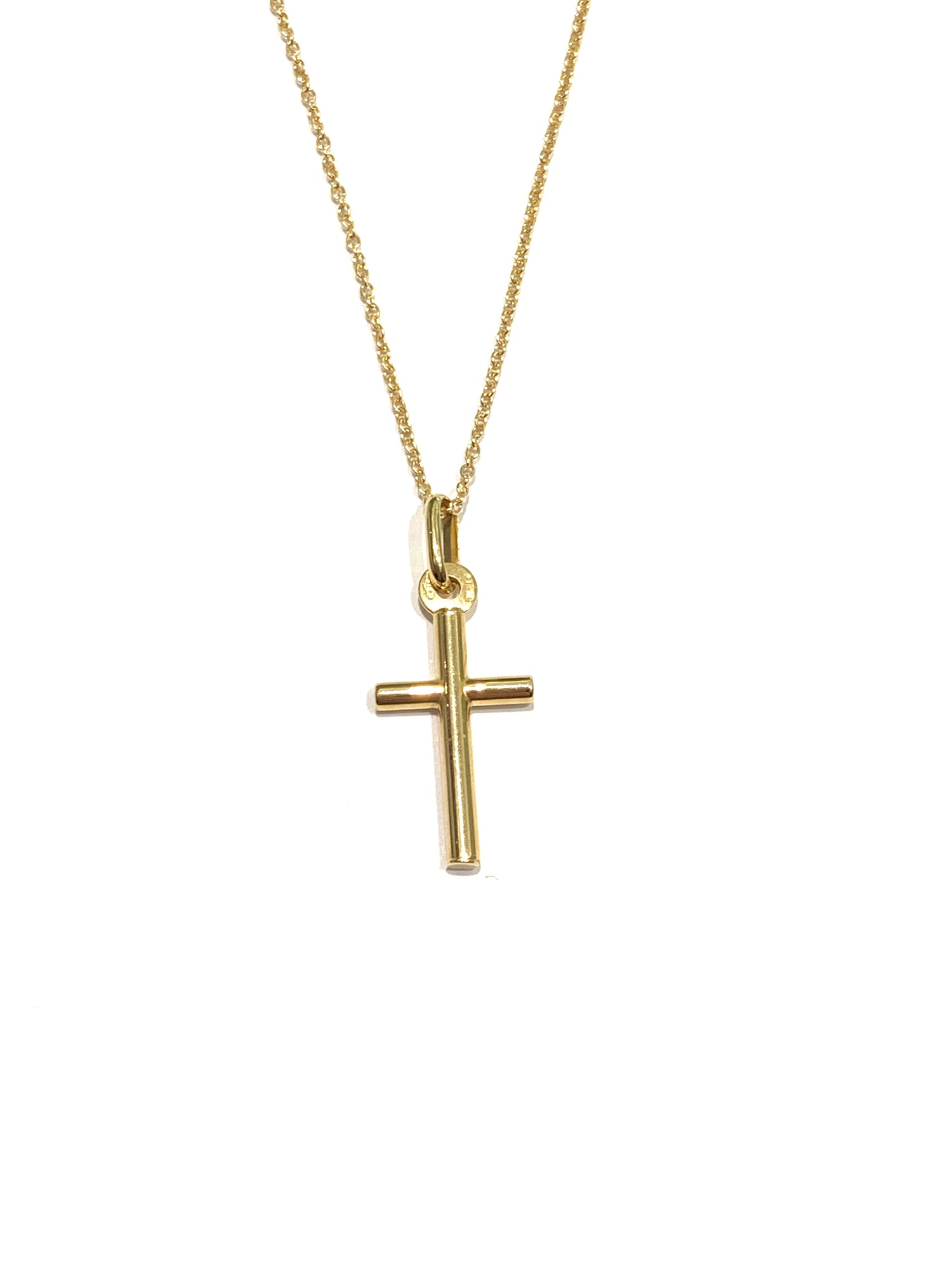 Collana in oro giallo 9kt con piccola croce.  Lunghezza catena 45 cm.  Dimensione croce 1x2 cm.