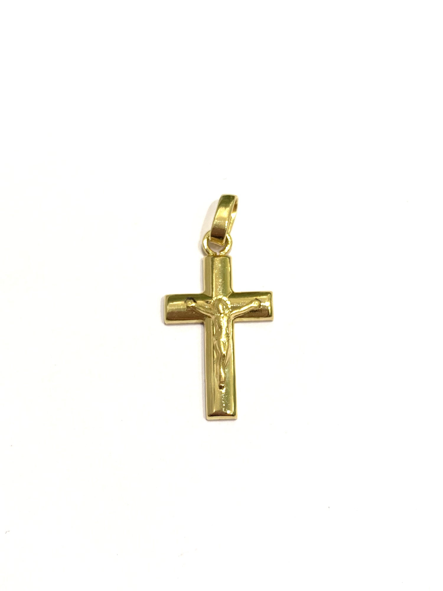 Ciondolo per collana in oro giallo 18kt con croce e cristo.  Dimensione 1,3x3 cm incluso 1 cm di anellino.