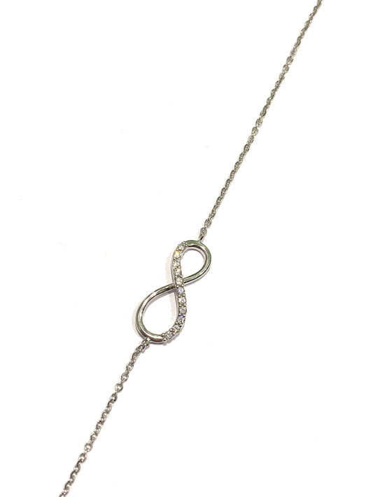 Bracciale oro bianco 18kt con infinito e zirconi