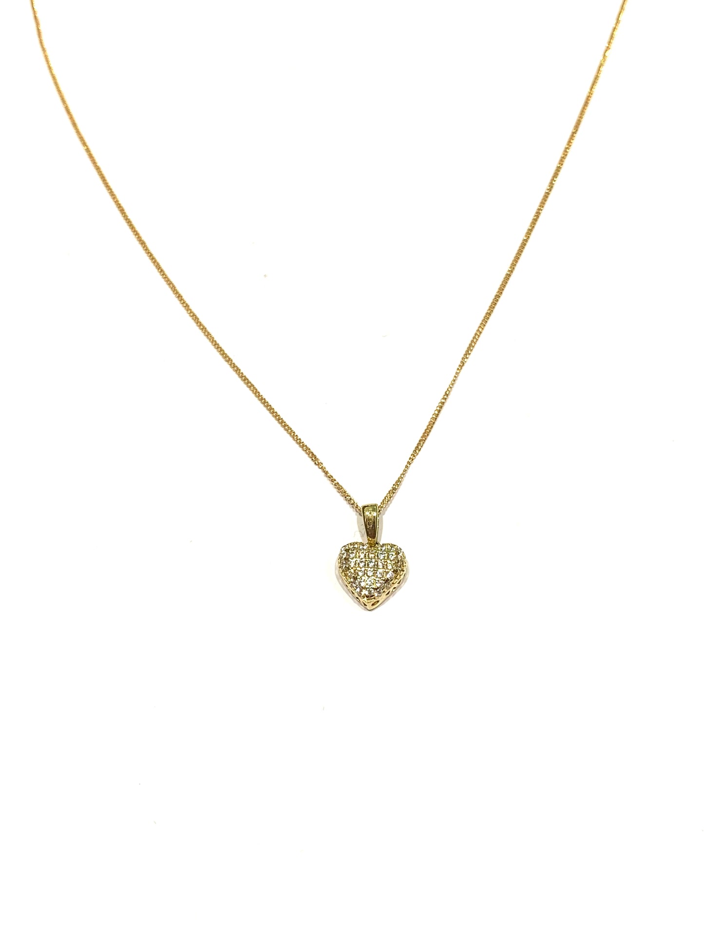 Collana in oro giallo 9kt con cuore ricoperto da zirconi.  Lunghezza catena 41 cm.  Dimensione cuore 1,3 cm incluso anellino.  