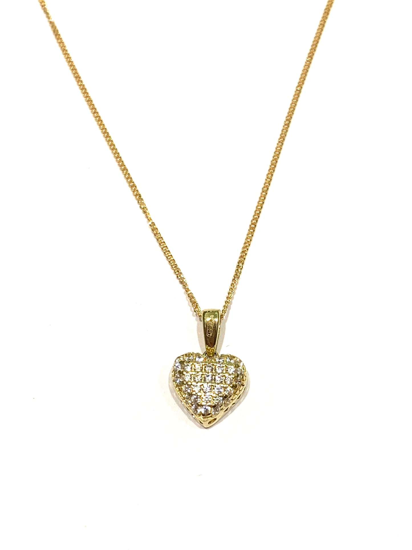 Collana in oro giallo 9kt con cuore ricoperto da zirconi.  Lunghezza catena 41 cm.  Dimensione cuore 1,3 cm incluso anellino.  