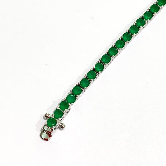 Bracciale tennis in argento con zirconi colore verde smeraldo.
Lunghezza 18,5 cm.